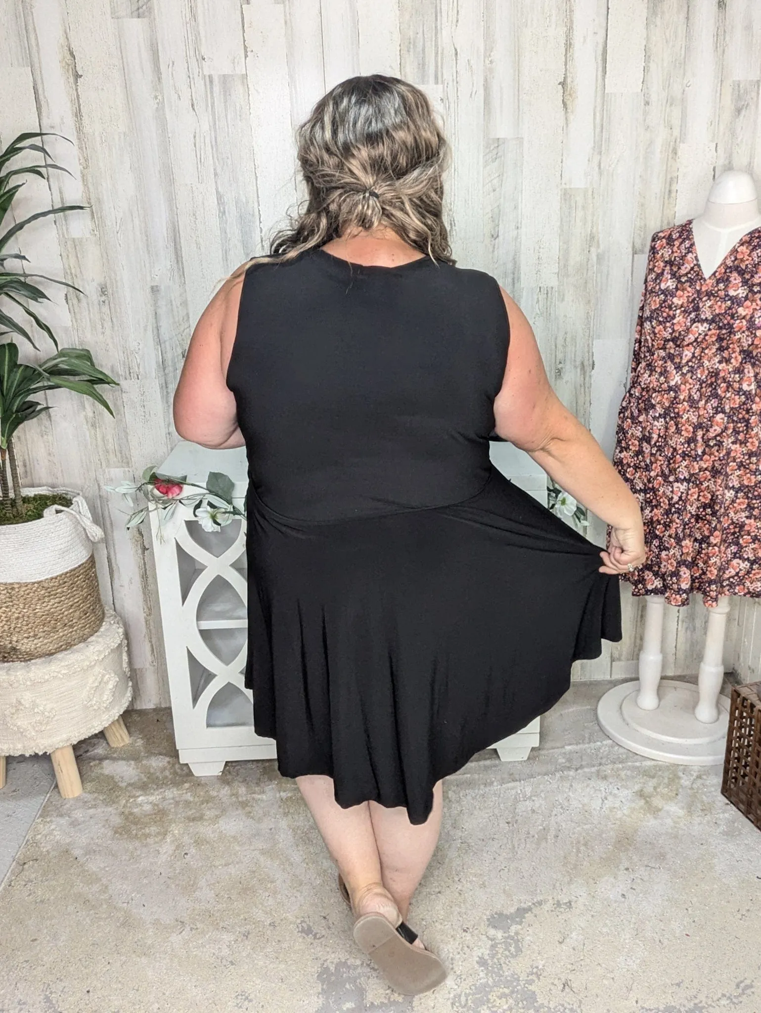 Briar Surplice Flutter Romper Dress in True Black