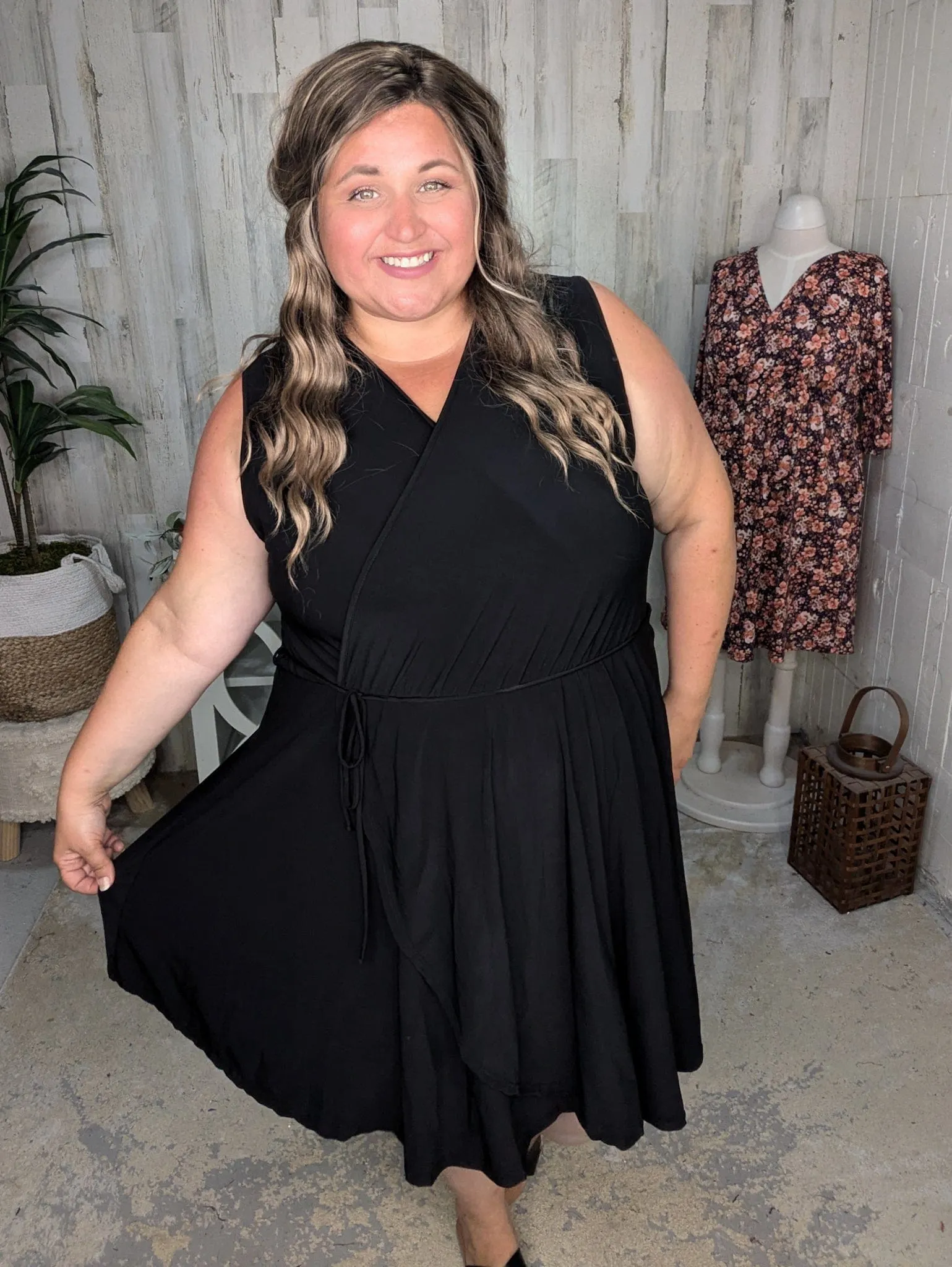 Briar Surplice Flutter Romper Dress in True Black