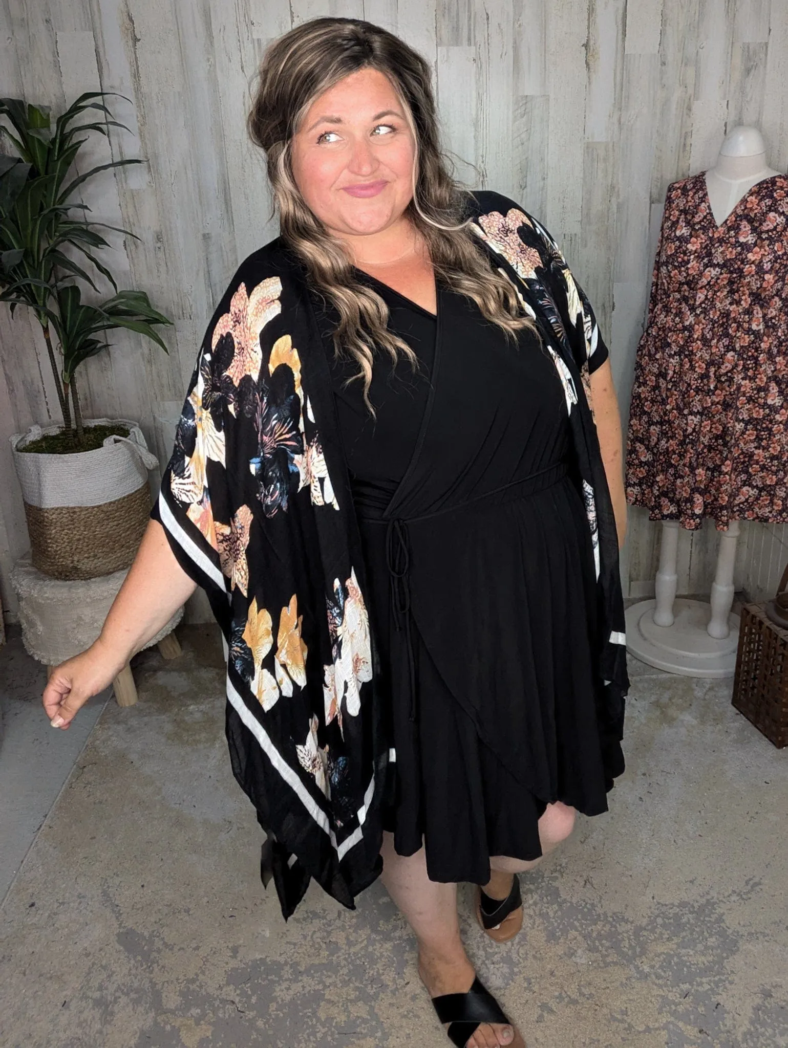 Briar Surplice Flutter Romper Dress in True Black