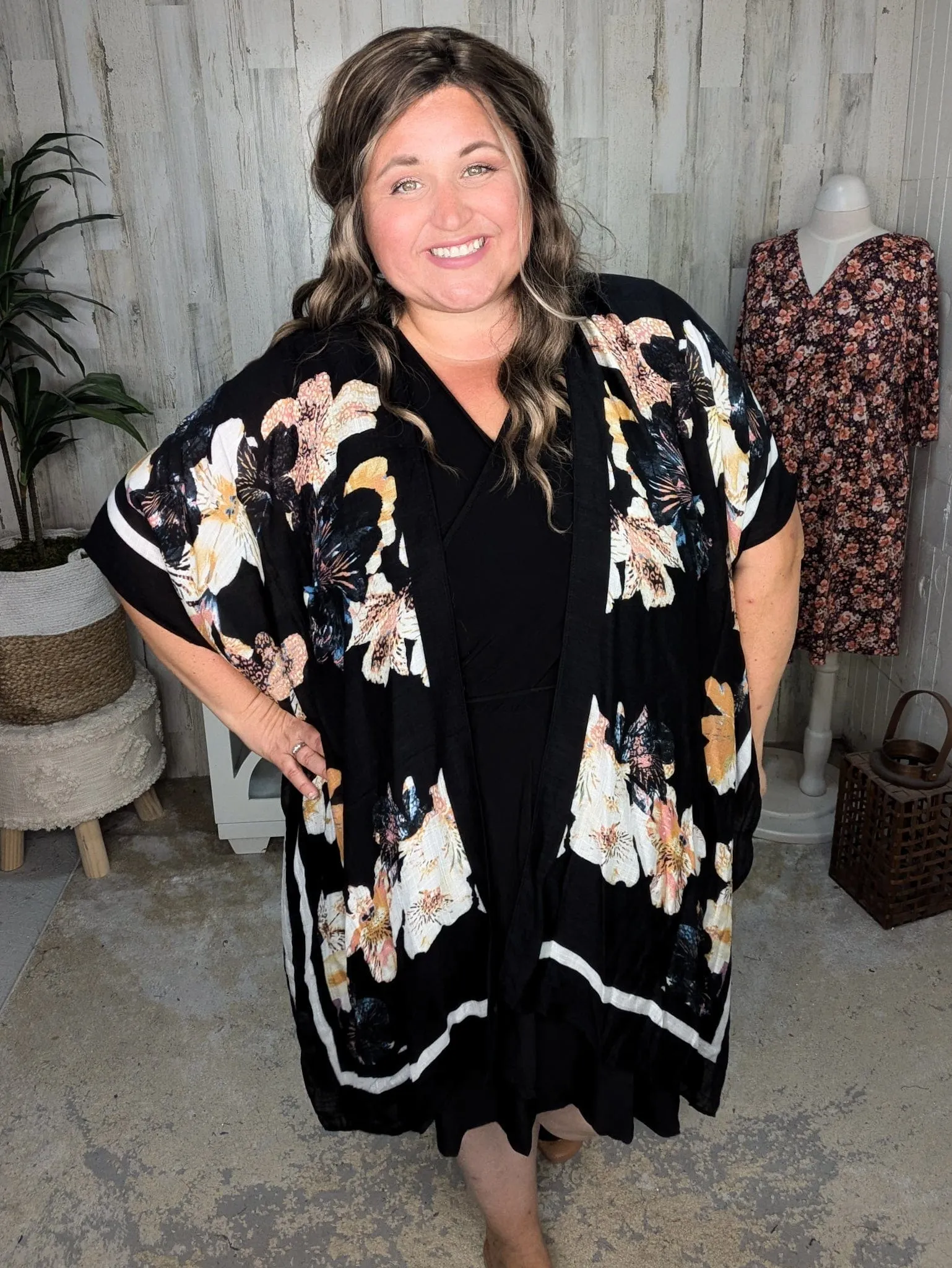 Briar Surplice Flutter Romper Dress in True Black