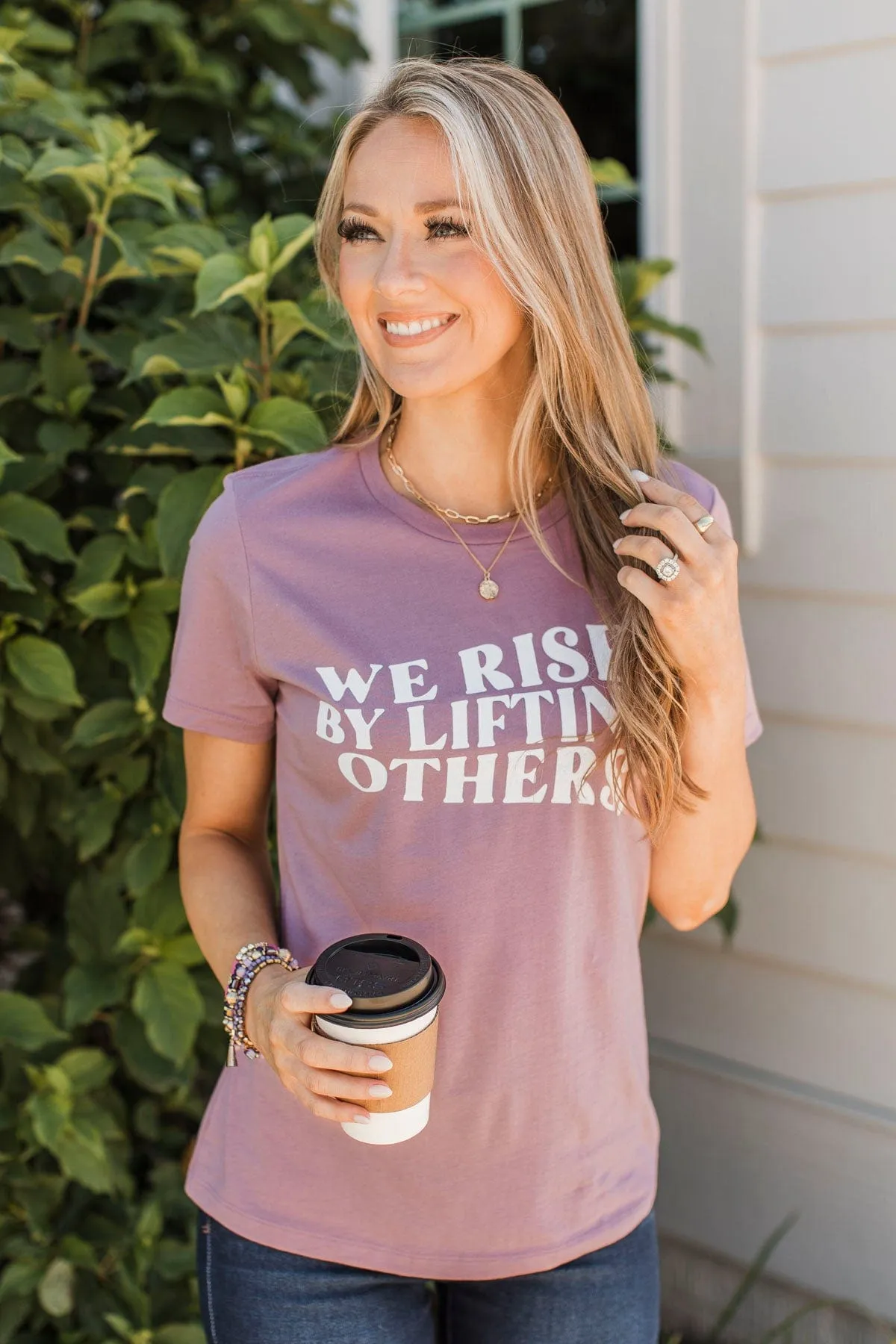 "We Rise By Lifting Others" Graphic Tee- Dusty Lavender